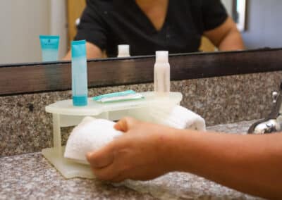 First Choice Inn's bathroom amenities. Soap, shampoo and moisturiser