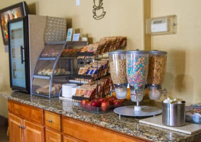 First Choice Inn' breakfast bar with a wide selsction of cereals, pastry, coffee, tea and fruits
