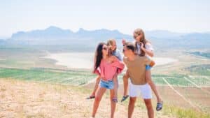 Family Exploring Outside Green River, Utah During Summer Vacation